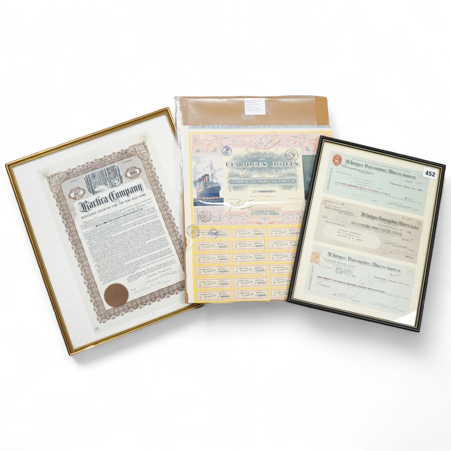 Share certificates, two framed to include McIntyre Porcupine Mines Ltd